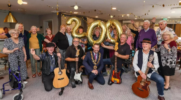 Mayor of Salisbury sings and dances at our party to celebrate 200 homeowners in Chapters