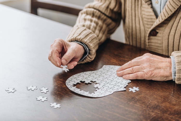 Senior completing a puzzle