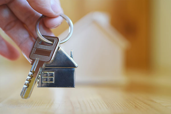 Man holding house keys